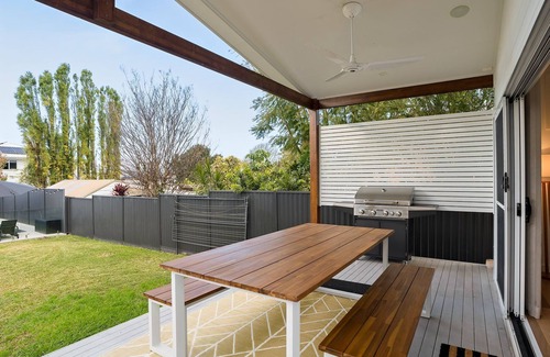 Warners Bay House | Stylish, private lakeside retreat complete with sparkling inground swimming pool. Sleeps 10.