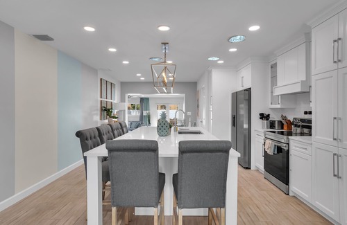 Melaleuca Gardens House | Stylish & Renovated 4BR W/Tiki + Heated Pool