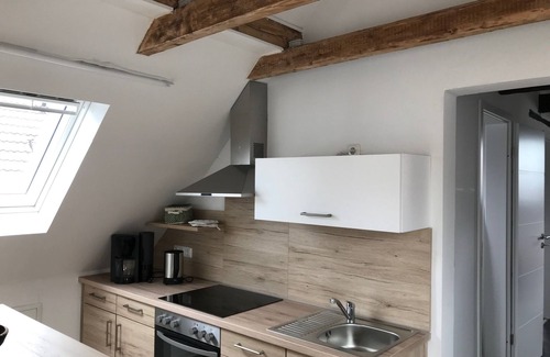 Greetsiel Condo | Stylish, romantic top-floor apartment with balcony and that certain something