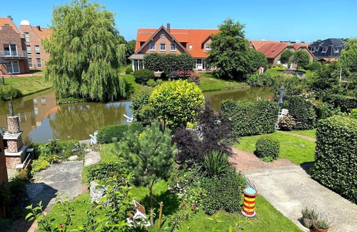 Greetsiel Condo | Stylish, romantic top-floor apartment with balcony and that certain something