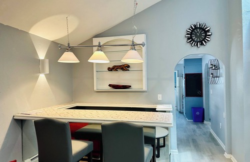 Seaside Heights Condo | Stylish Seaside Serenity with Pool Jersey Shore - Heart-Shaped Tub & Sunroom