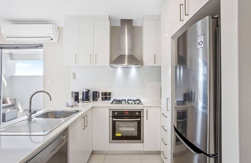 Woodlands Apartment | Stylish urban oasis with balcony & street views!