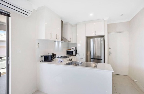 Woodlands Apartment | Stylish urban oasis with balcony & street views!