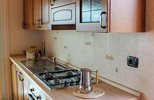 Poppino Apartment | Stylishly furnished vacation apartment in a residence with pool & dream lake view