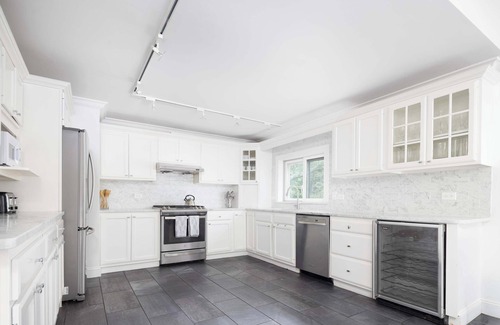 East Hampton House | Summerwood by Rove Travel Home with Pool & Hot Tub