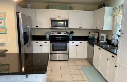 The Villages House | Sunlit retreat overlooking championship fairways—your Florida oasis awaits!