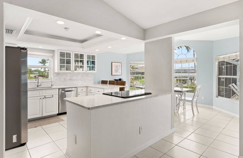 Caloosahatchee House | SunLit SeaWay: WATERFRONT Luxury! Heated Salt H2O Pool & Spa + PRIVATE Dock