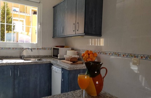 Cumbre del Sol Apartment | Sunny apartment on the Cumbre Del Sol with views of the mountains, air conditioning, wifi