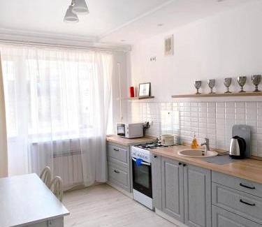 Uralsk Apartment | Sunny Home