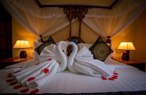 Uroa Hotel | Sunny Palms Beach Bungalows