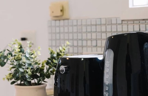Sunnybank House | Sunnybank Dual Stay: 4BR Home + Studio, Sleeps 12