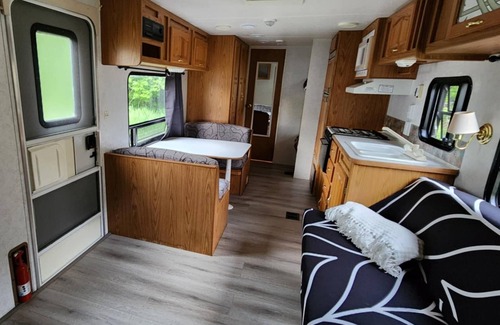 Garden House | "Sunrise Beach" Travel Trailer on 435' of Lake Michigan frontage- Fish on!