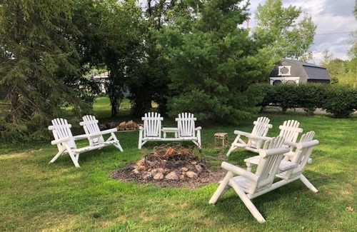 Amery Cabin | Sunset Cottage on Lake Wapogasset, Amery WI with Bunk Room, Hot Tub, AC, & more