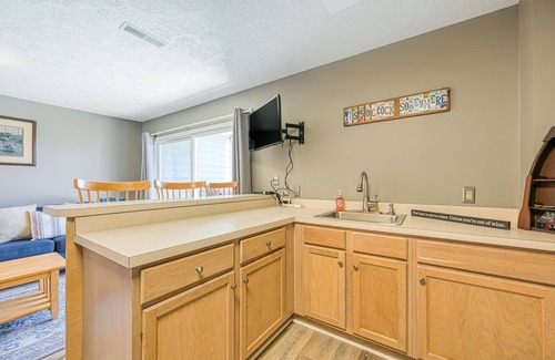 Huddleston House | Sunset Cove - Waterways lakefront retreat with boat slip, pool & beach - dogs OK