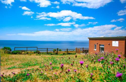 Saint John House | Sunset sea view chalet with hot tub