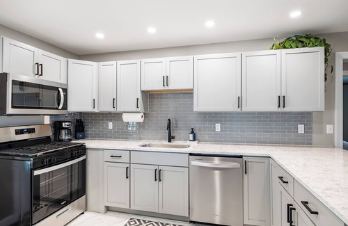 La Porte House | Sunset Shores - Lakefront Home with Hot Tub and Fire Pit