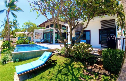 Rayong Villa | Superb 4 bedroom villa on the beach with a private swimming pool .