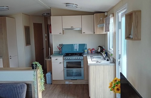 New Quay Ski Chalet | Superb position 2 bedroom Caravan Newquay Wales