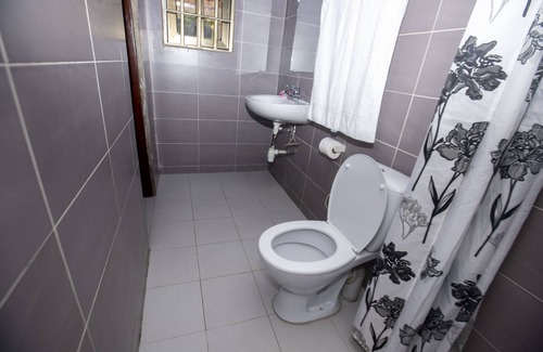 Porto-Novo Apartment | Superbe Appartement 1 lit de 2 Place Avec Douche Personel Ideal Pour 2 Personnes