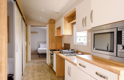 Mablethorpe House | Superior 12ft-wide caravan with two twin with four singles.
