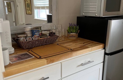 Ligonier Apartment | Superior comfort awaits you in this stylish suite walking distance to many shops and restaurants