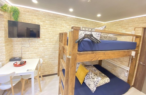 Tsurumi Ward Condo | Support for 8 persons! A fun room with Minions on the rampage! Kyocera Dome 9 min, USJ 20 min, 2 stations to Namba / Dotonbori / Only 4 min from Taisho station to the room (3 min from Taisho subway station)
