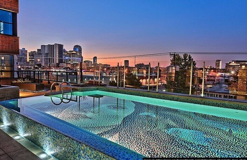 Deep Ellum Apartment | Surf Richard's Flat~ 2-Bedroom Penthouse ~ Theatre Room ~ Secret Game Room ~