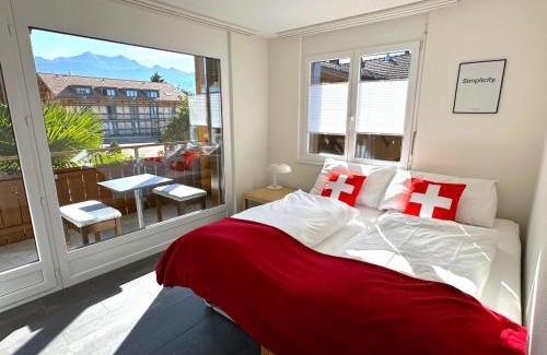 Merligen Apartment | SwissHut Stunning Views Alps Lake - Apart. Innerdorf