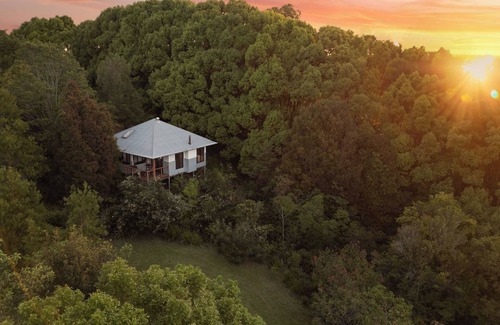 Teven Cottage | Tallaringa secluded romantic cottages - outdoor spa, king size bed and fireplace