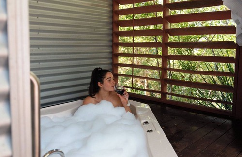 Teven Cottage | Tallaringa secluded romantic cottages - outdoor spa, king size bed and fireplace