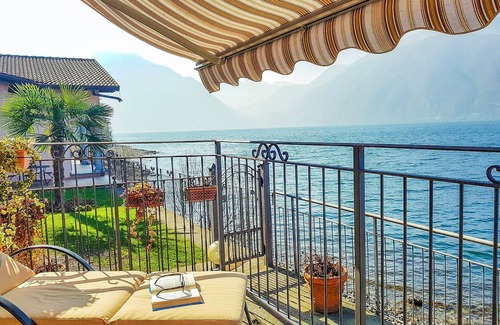 Lezzeno Apartment | Tastefully furnished 2-room apartment in direct sea location with pool and private beach