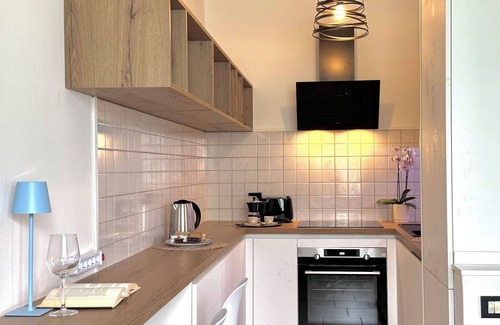 Lezzeno Apartment | Tastefully furnished 3-room apartment on the lakefront with pool and private beach