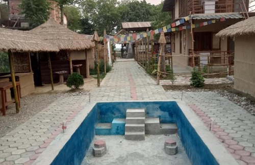 Chitwan District House | The 90's sauraha