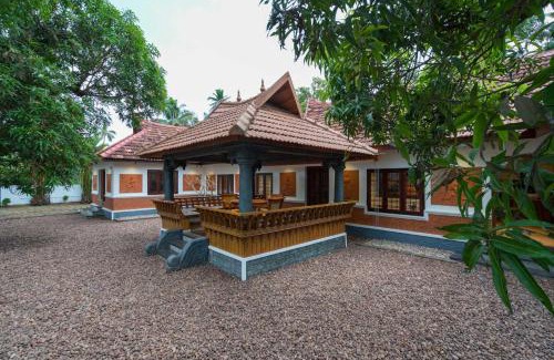 Mankombu Villa | The Backwater Heritage- Comp Breakfast with River View, Ocean Breeze & Lawn by StayVista -