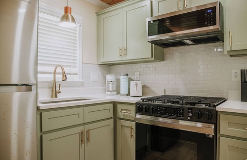 Ocean Springs House | The Beachcomber A - 2 bedroom in Golf Cart District near beaches and downtown!