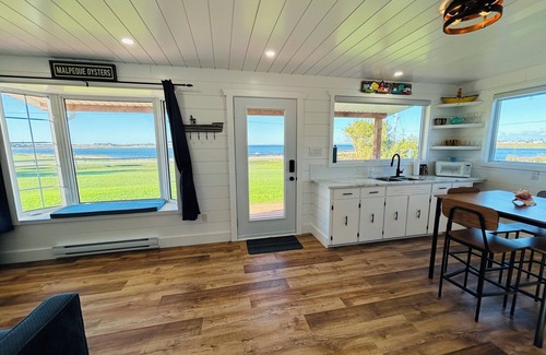 Malpeque Cottage | The Blue Buoy- Hot tub, King bed, Centrally located, stunning views.