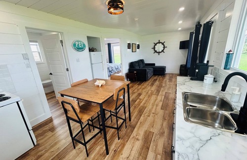Malpeque Cottage | The Blue Buoy- Hot tub, King bed, Centrally located, stunning views.