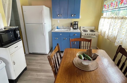 Canadohta Lake Cottage | The Bluebird, a rustic lakefront cottage at The Pier at Canadohta Lake sleeps 6!