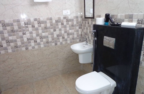 Porur House | The Blues Hospitality Porur Gardens King Room