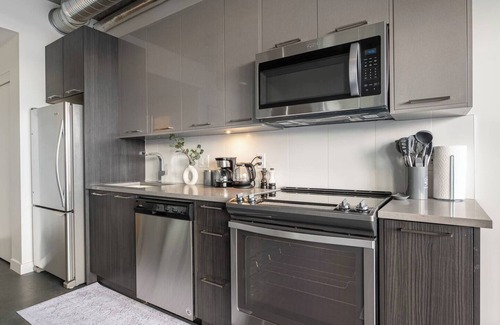 East Village Apartment | The Brixton - DT Views, by Bow River & Saddledome