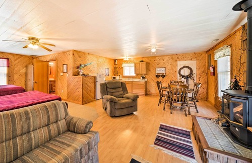 Bellevue Apartment | 'The Burgundy Cabin' Iowa Retreat: Pond & Fire Pit