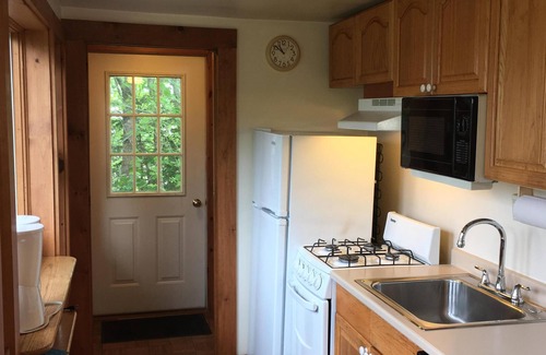 Bass Harbor Cottage | The Carriage House. Waterfront Bass Harbor. Balcony. Dining Deck. Sauna.