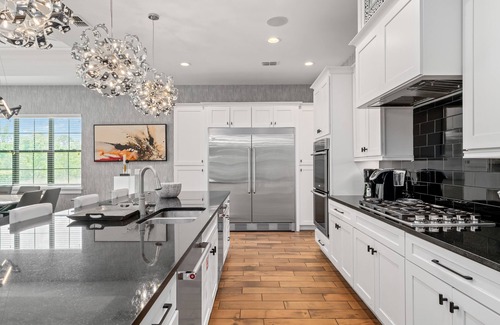Reunion House | The Deluxe Mansion | 11 bed, 11.5 bath | Theater Room | Themed Bedrooms | Games Room | Private Pool