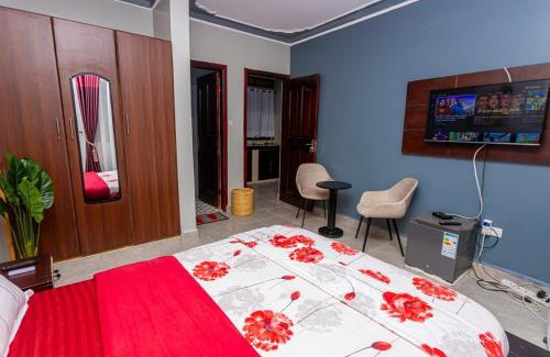 Soroti Apartment | The Den Soroti Red & White