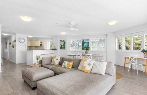 Currimundi Apartment | THE ENTRANCE UNIT 5 - Relax on a sunlit balcony overlooking Currimundi Lake, with birds singing in t