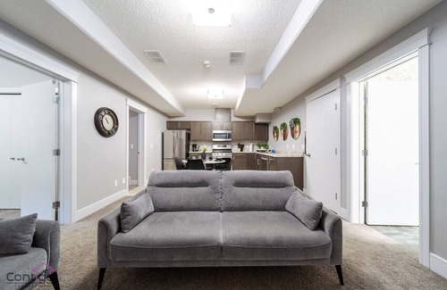 Southeast Edmonton Condo | The Getaway Suite | King Bed | Near Airport | WiFi
