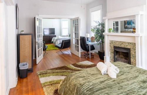 Woodland Heights Apartment | The Great Pink Lady with Huge Wrap Around Porch!