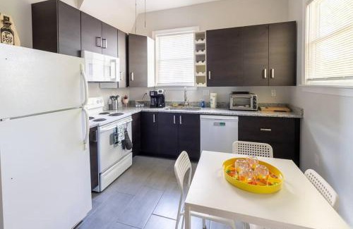 Woodland Heights Apartment | The Great Pink Lady with Huge Wrap Around Porch!