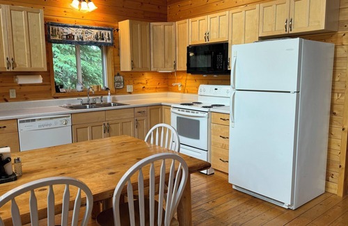 Columbia Falls Cabin | The Grizzly Cabin at Glacier Park is in the remote North Fork, Flathead River.