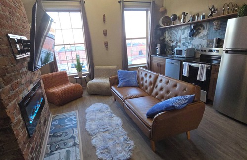 Petersburg Apartment | The Henry Lofts 2-bedroom apt., dog friendly fenced yard, arcade, coffee shops
